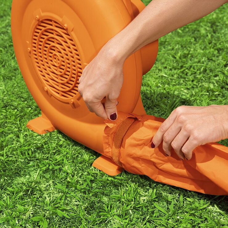 Lifestyle image of a woman setting up the water park