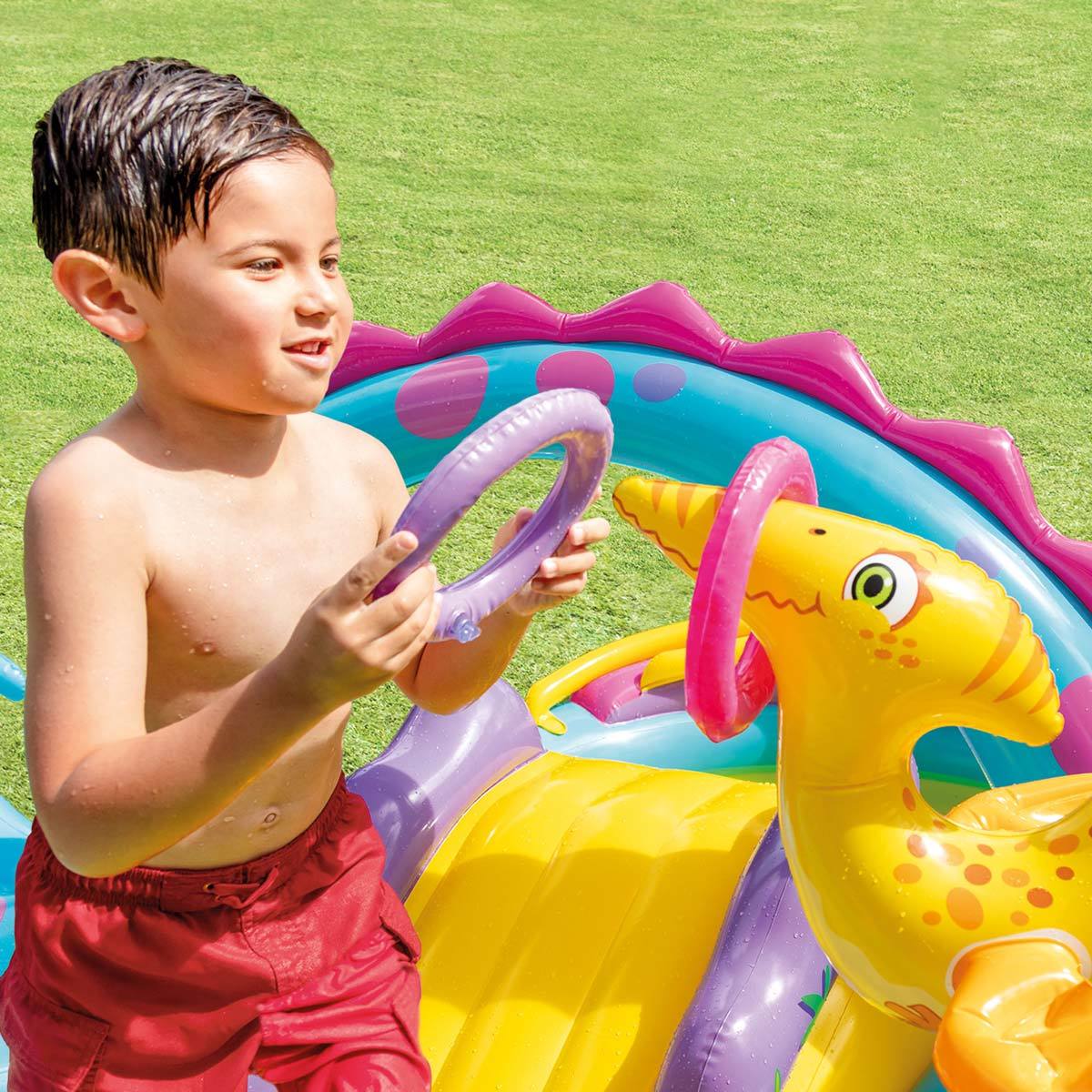 Child playing in Dinoland kids pool