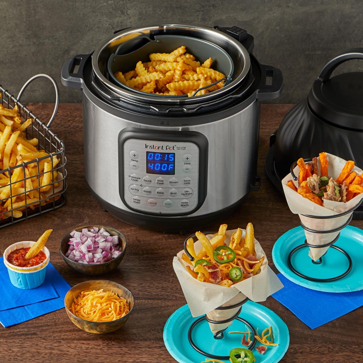 Lifestyle image of Instant Pot Duo Crisp 8 with various fries and dips