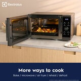 Lifestyle showing features of the microwave Lifestyle showing features of the microwave