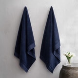 Two blue towels hanging