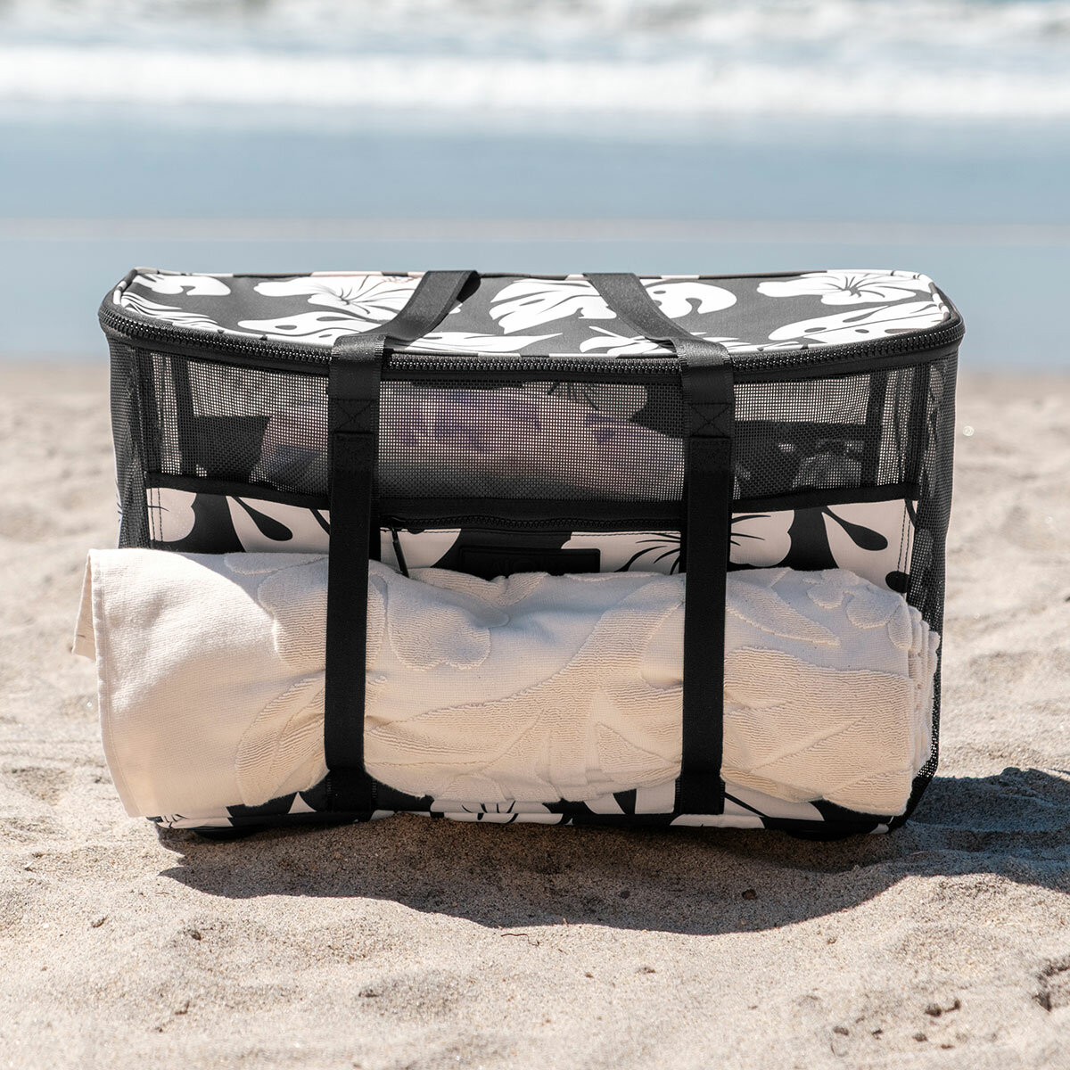 Lifestyle image showing the webbing straps holding a towel Lifestyle image showing the webbing straps holding a towel