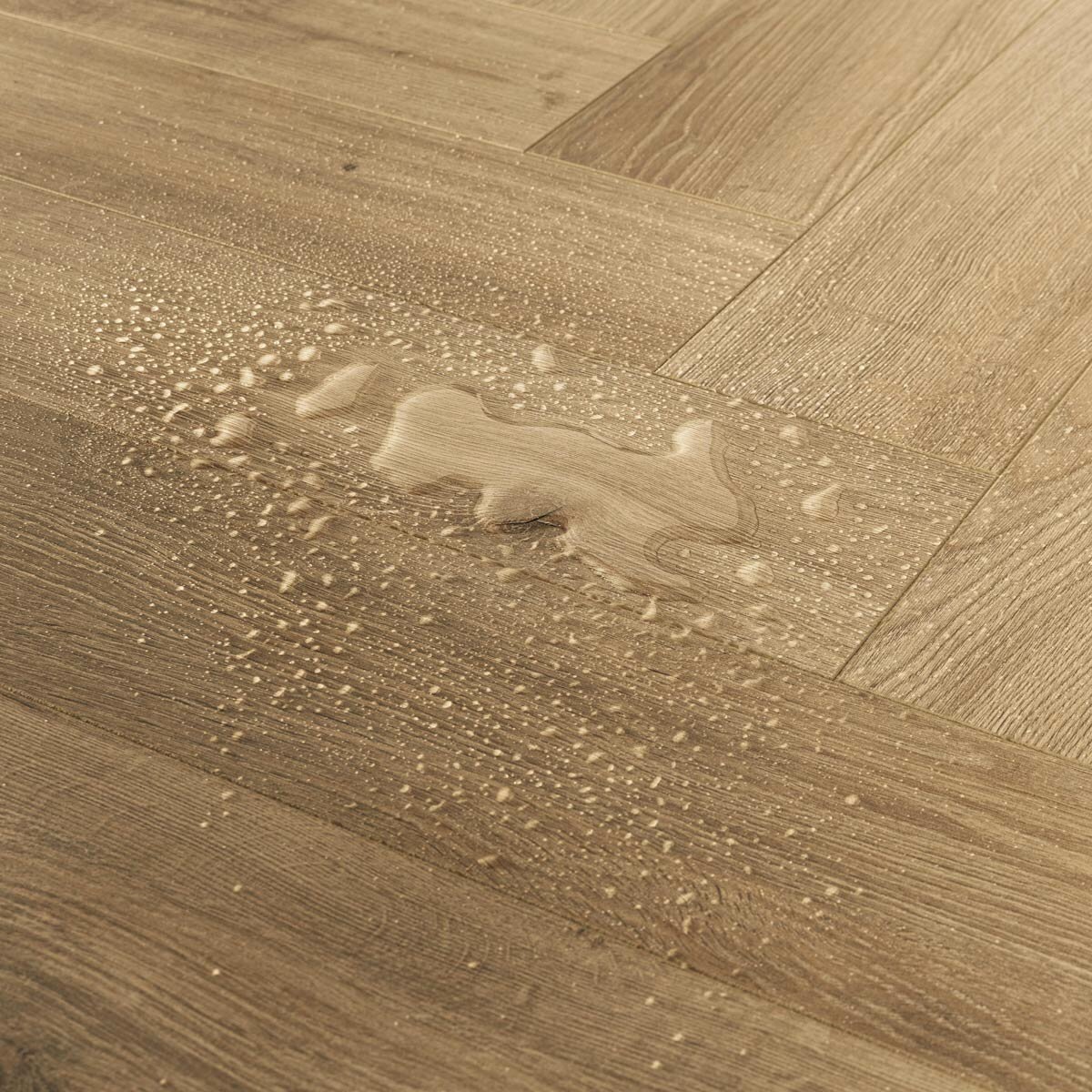 Golden Select Amboise (Oak) Splash Shield AC5 Laminate Herringbone Flooring - 1.179² Per Pack Golden Select Amboise (Oak) Splash Shield AC5 Laminate Herringbone Flooring - 1.179² Per Pack