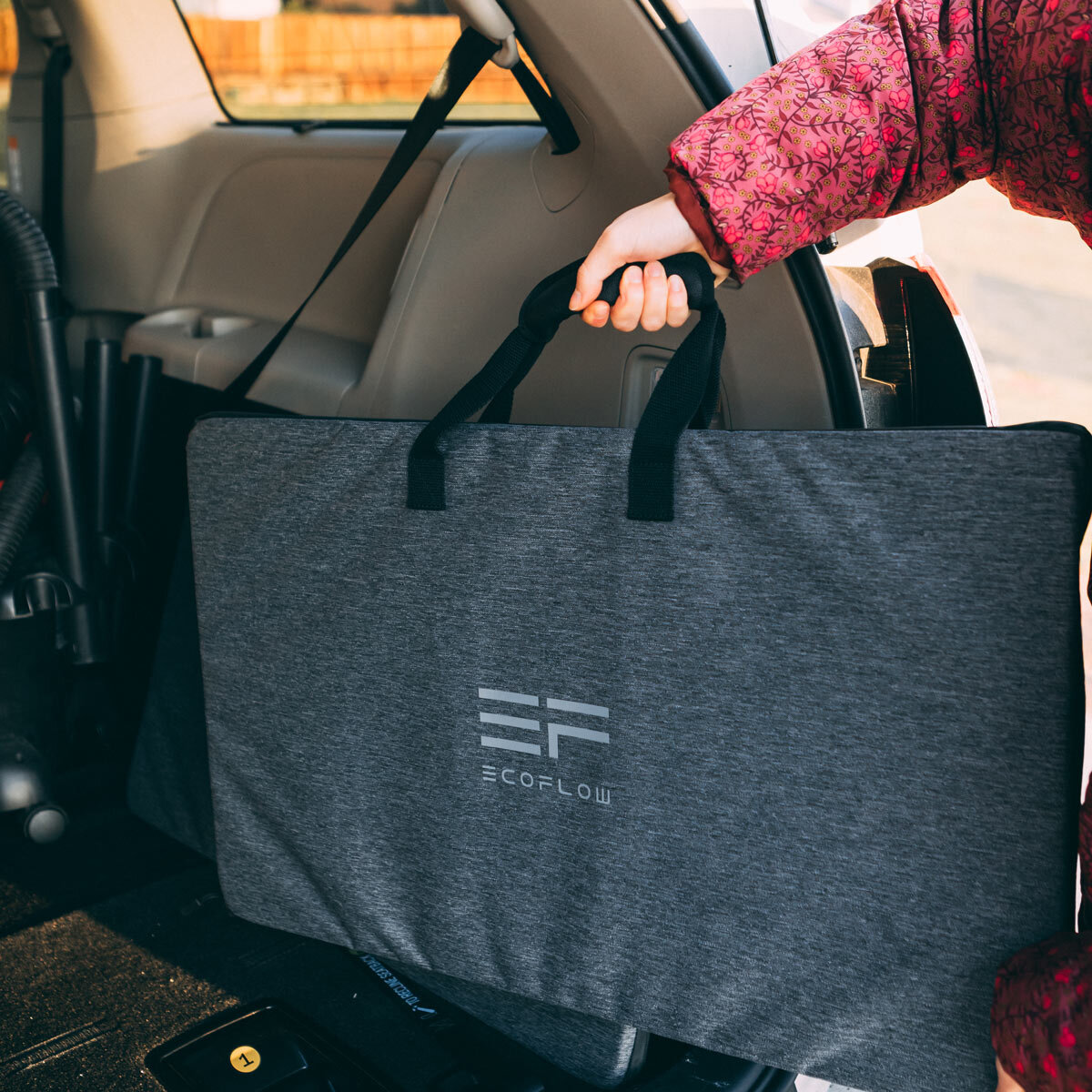Lifestyle image of solar panel in bag