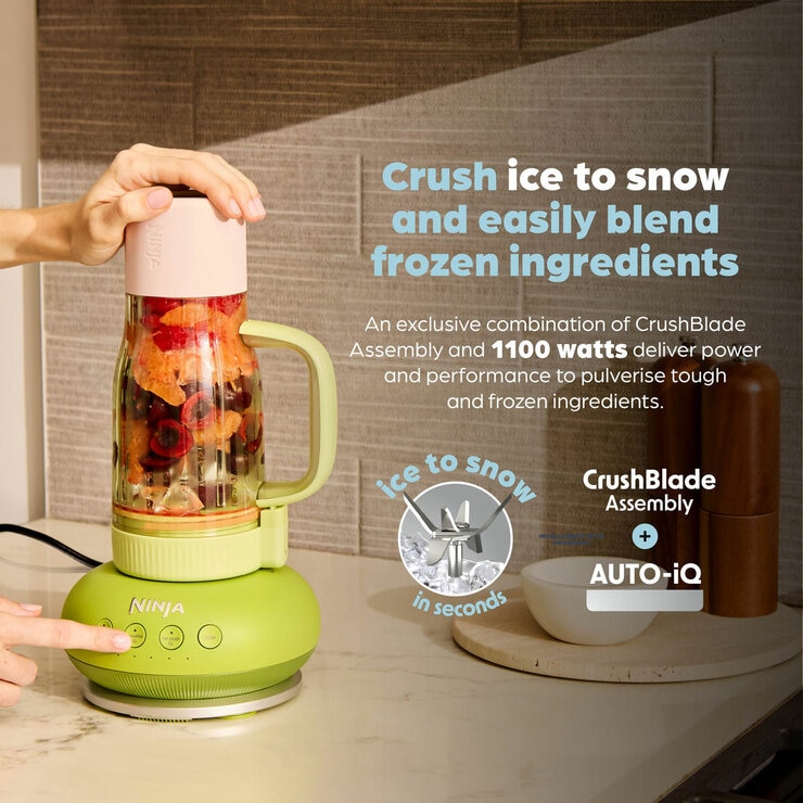 Lifestyle image of Ninja BlendBoss Tumbler blender blending frozen ingredients