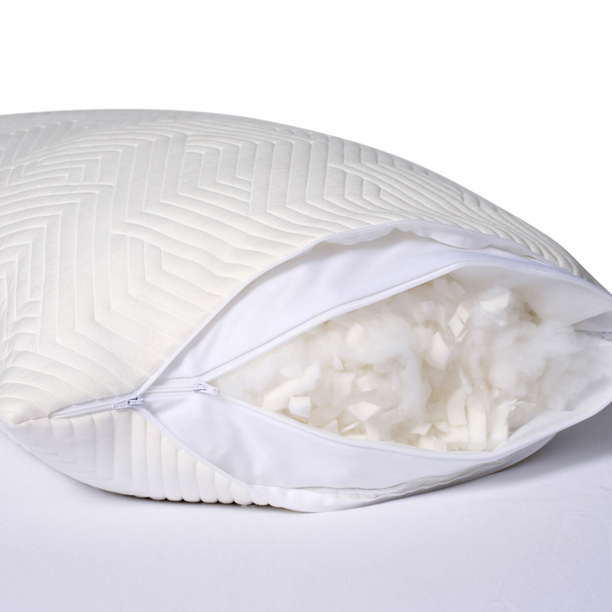 Pillow shown unzipped to reveal shredded foam and fibre filling, Customisable firmness