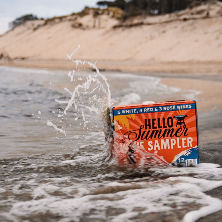 Lifestyle image of box on the beach in the waves Lifestyle image of box on the beach in the waves