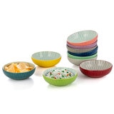 signature houseware stoneware bowls with food in plain background