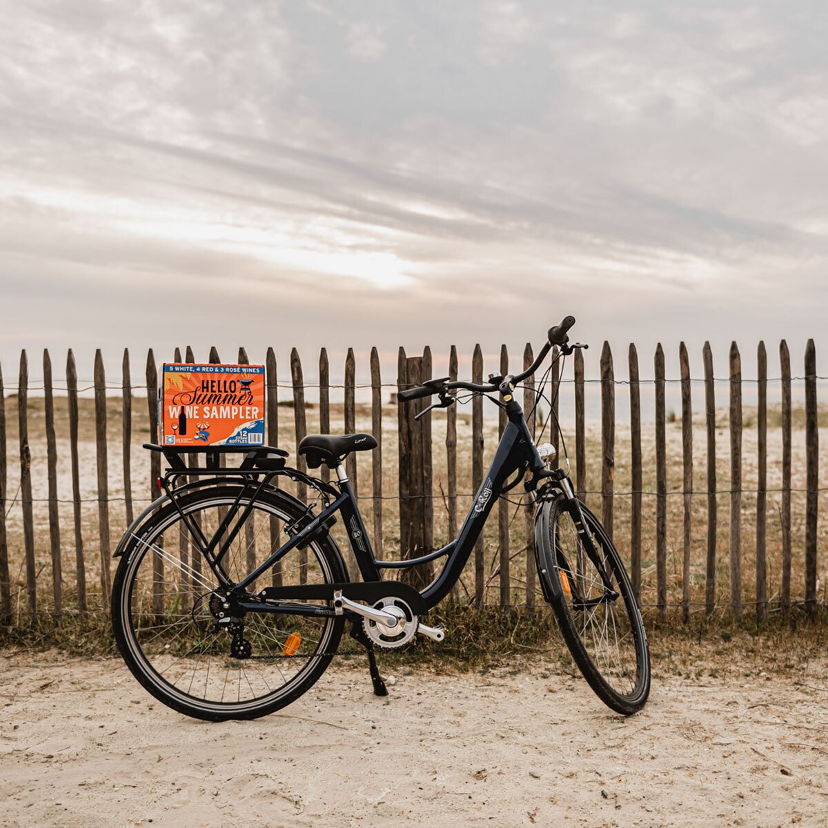 Lifestyle image of box on back of bike at the beach