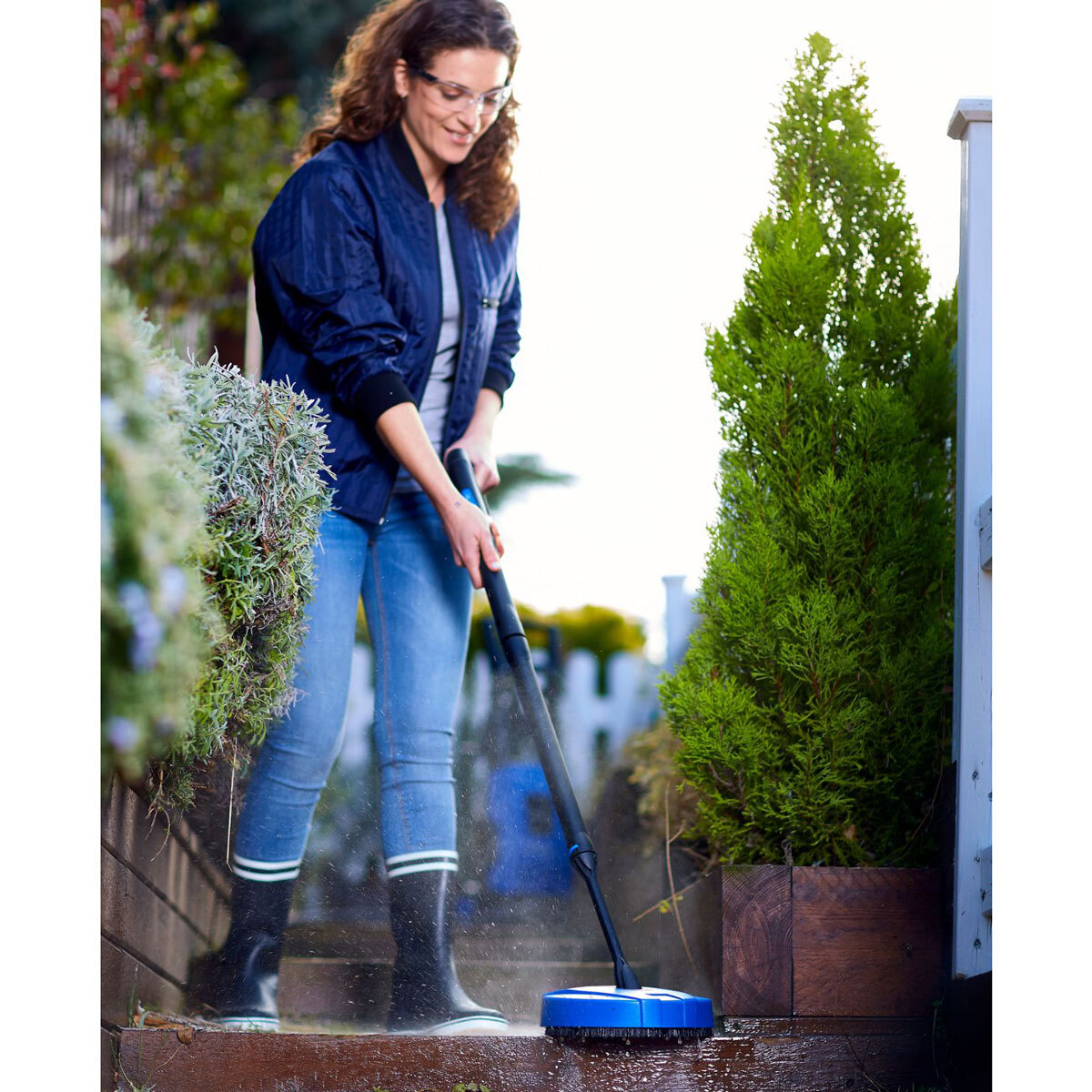 Lifestyle image of pressure washer in use