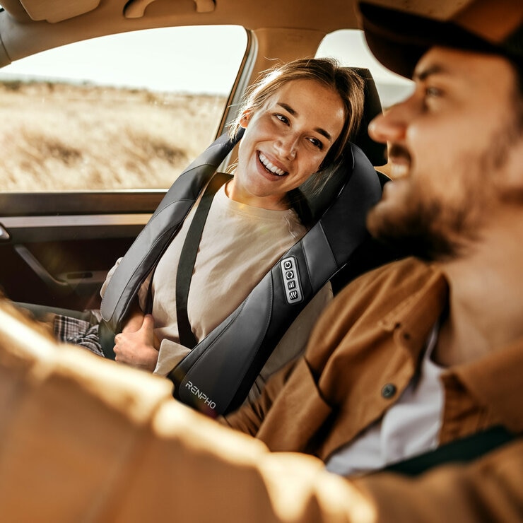 Lifestyle image of Renpho Shiatsu Neck and Shoulder Massager being used in the car by a passenger