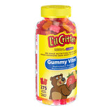 Side on shot of gummy vitamins in plastic jar with yellow label