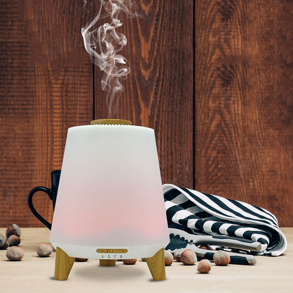 Lifestyle image of Vybra Atmos Diffuser in pink