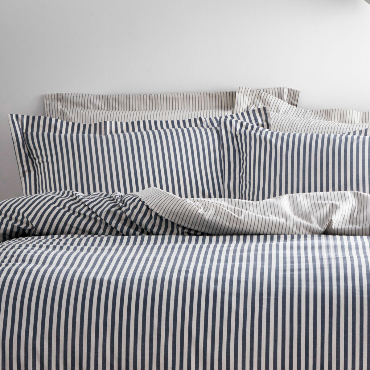 Blue and white vertically striped duvet set with matching