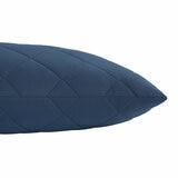 Quilted blue body pillow with diamond stitching