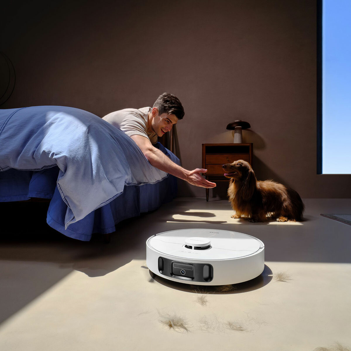 Lifestyle image of MOVA E30 Ultra Robot Vacuum cleaning pet hair