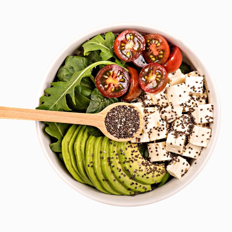 Avocado, cheese and tomato on a plate