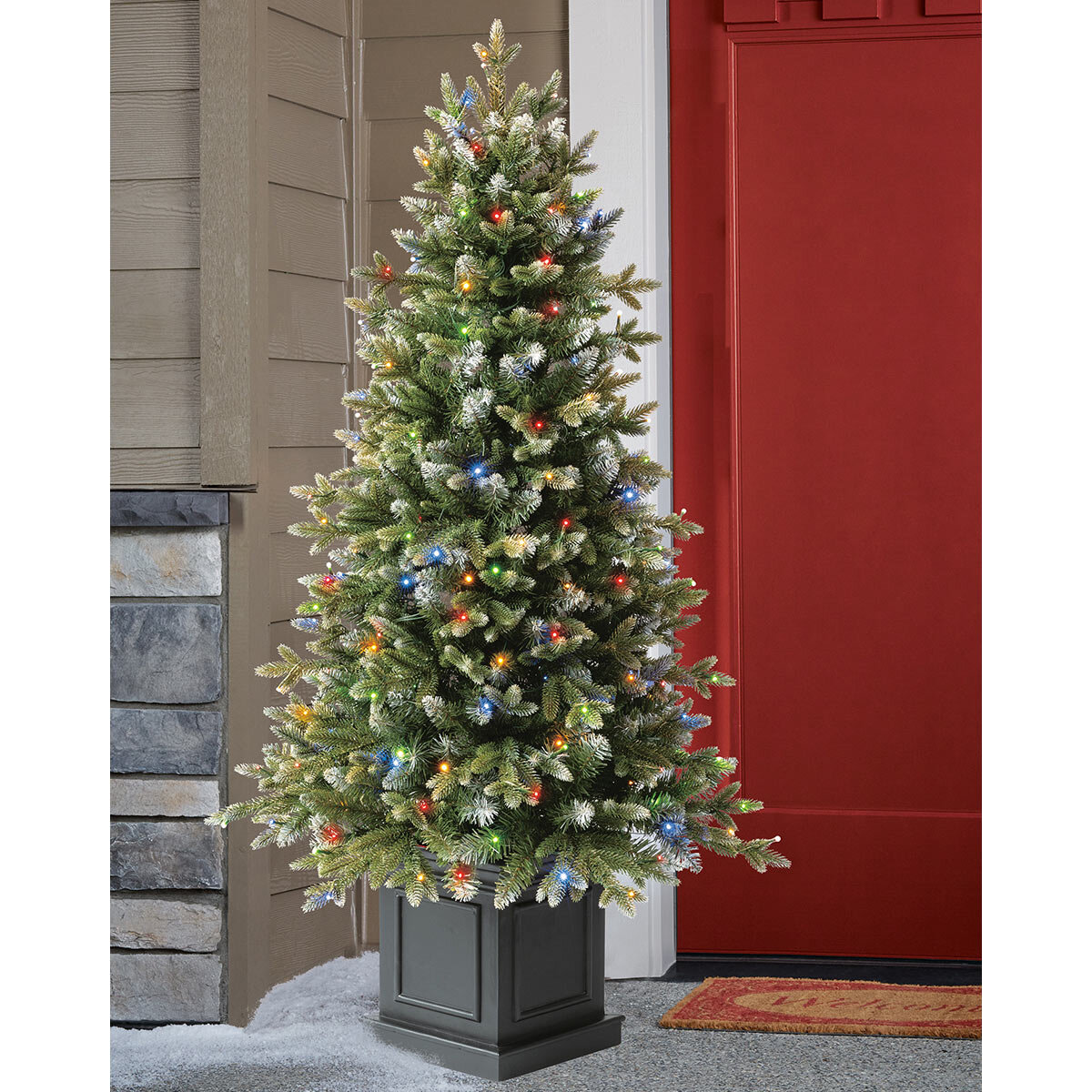 Buy 4.5' Pre-Lit Potted Tree Lifestyle2 Image at Costco.co.uk