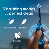 Lifestyle image of Oral-B iO2 Electric Toothbrush with 3 brushing modes