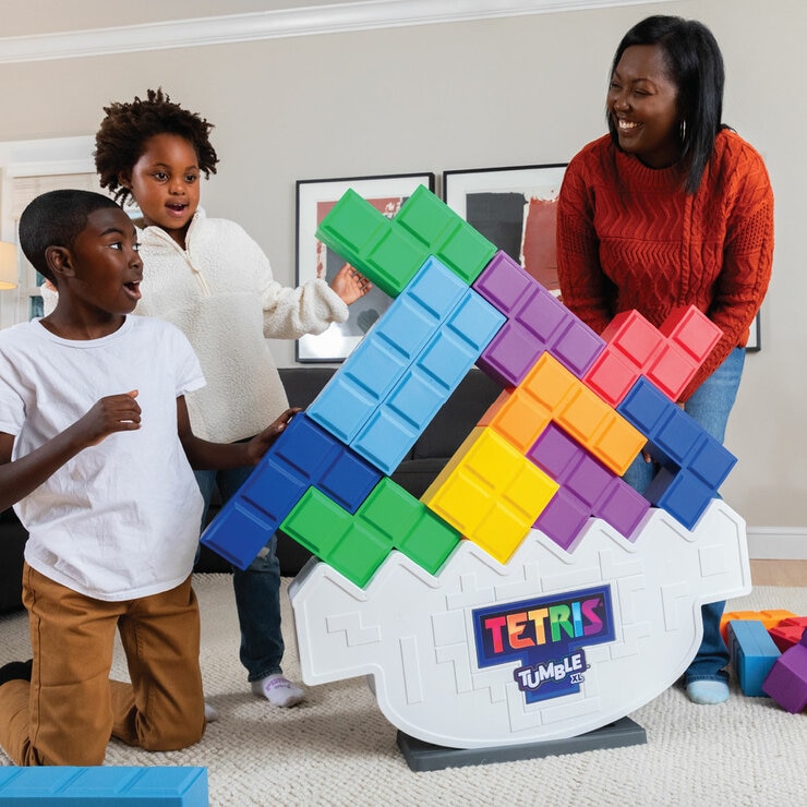 Lifestyle image of a woman and children playing Tetris Tumble XL