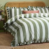 Green and white striped duvet set with scalloped detailing and matching pillow shams. Green and white striped duvet set with scalloped detailing and matching pillow shams.