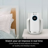 Lifestyle image of Shark NeverChange5 Air Purifier used in a bedroom