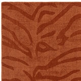 Asiaitc Tigra Rug in burnt orange colour with tiger print pattern Asiaitc Tigra Rug in burnt orange colour with tiger print pattern