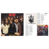 page spread of rock covers