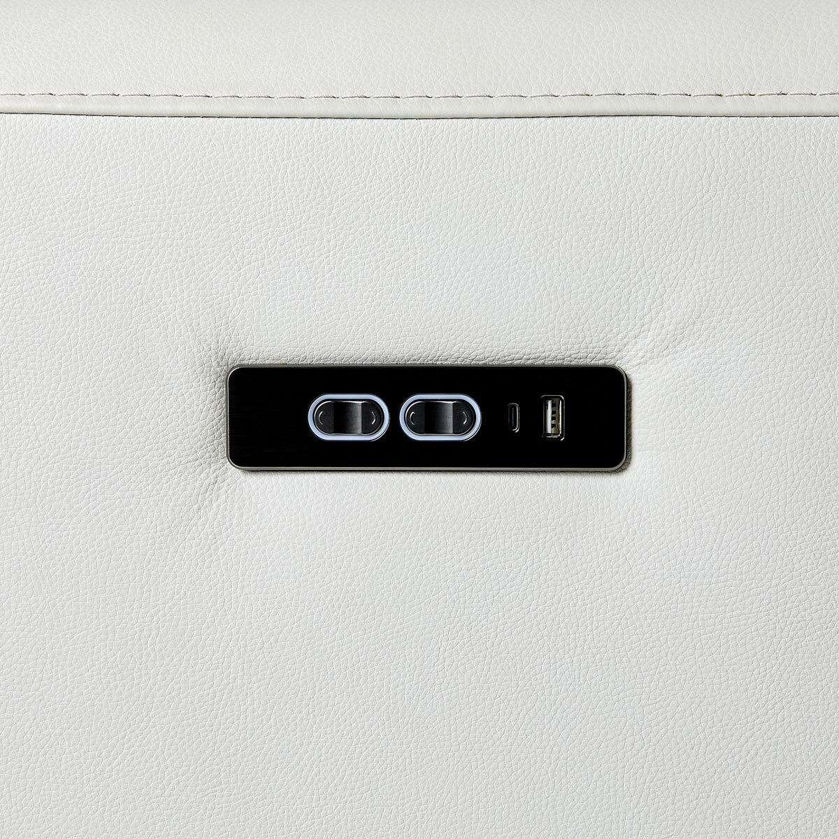 Charging ports and reclining control Charging ports and reclining control