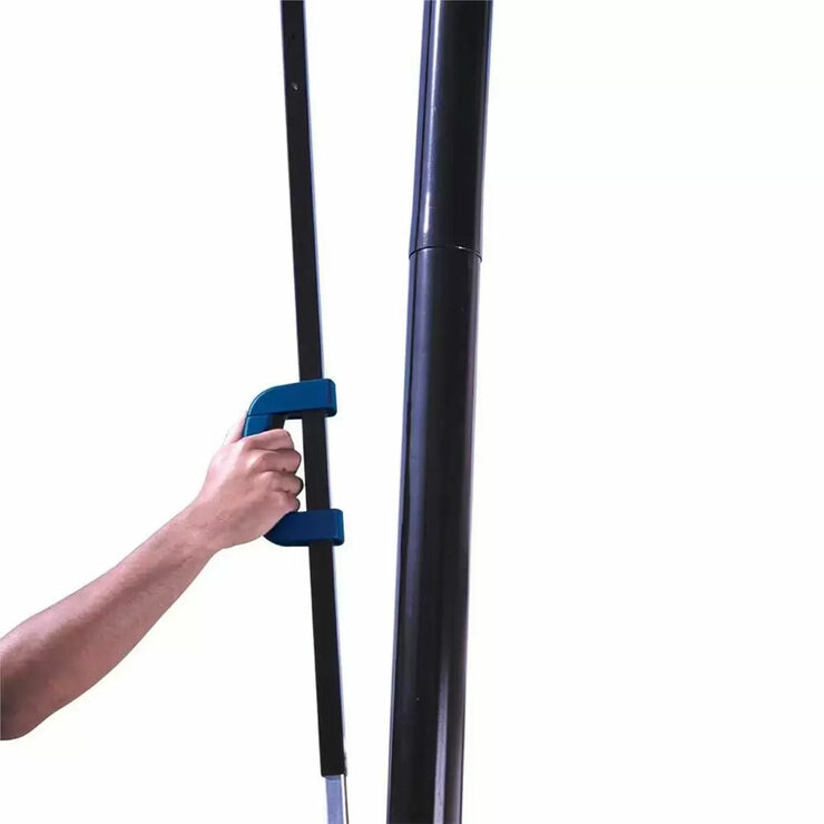 Lifestyle image showing someone holding the handle to position the basketball hoop