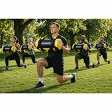 Lifestyle image of a group of people training with the power bag Lifestyle image of a group of people training with the power bag