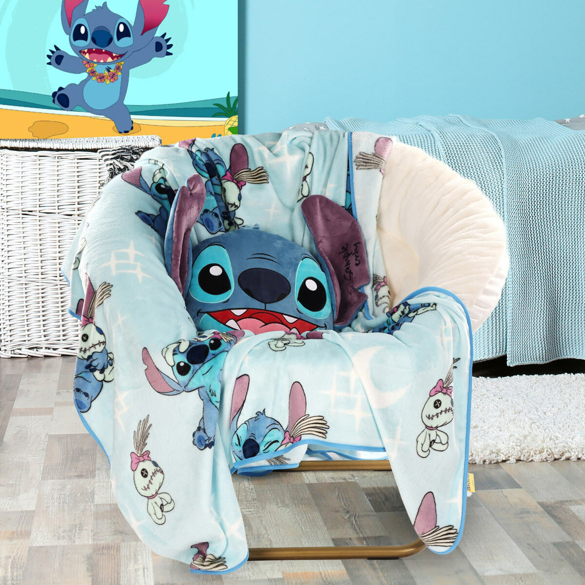 Imagery of Disney Stitch blanket/pillow set styled on a bedroom chair