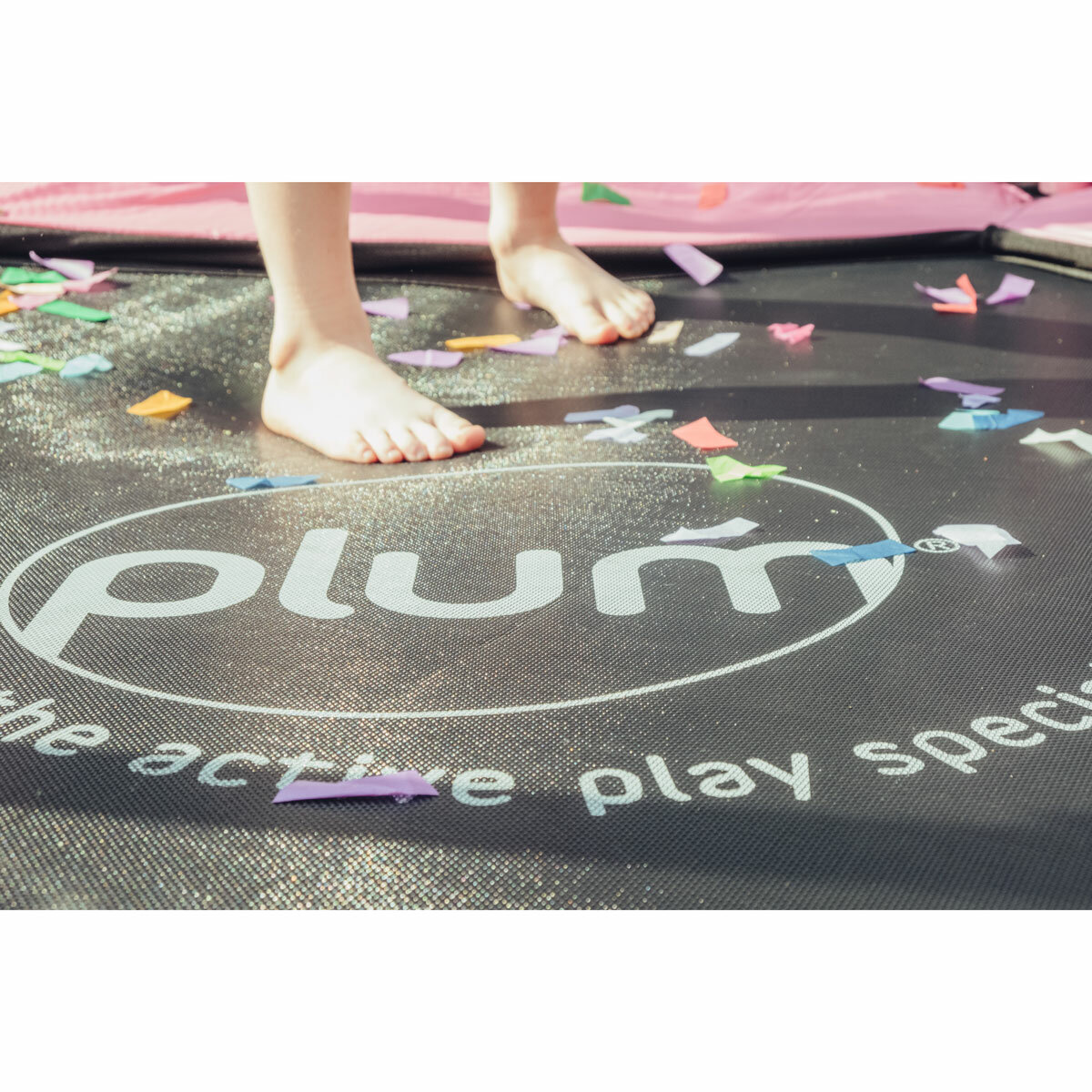 Lifestyle image of the Plum logo on the trampoline