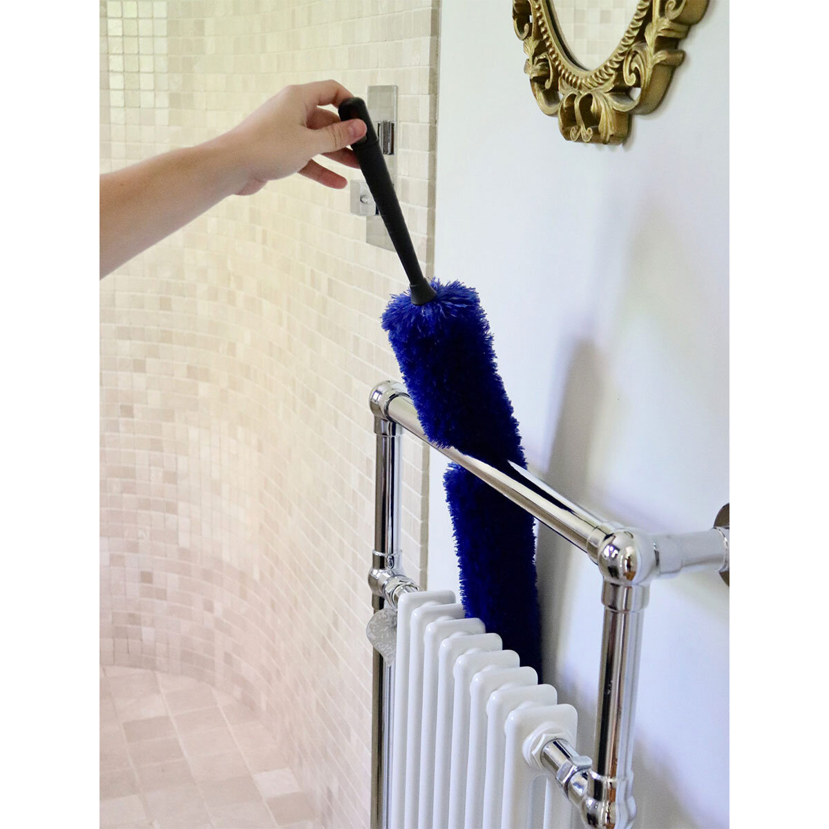 Lifestyle image of duster being used to clean