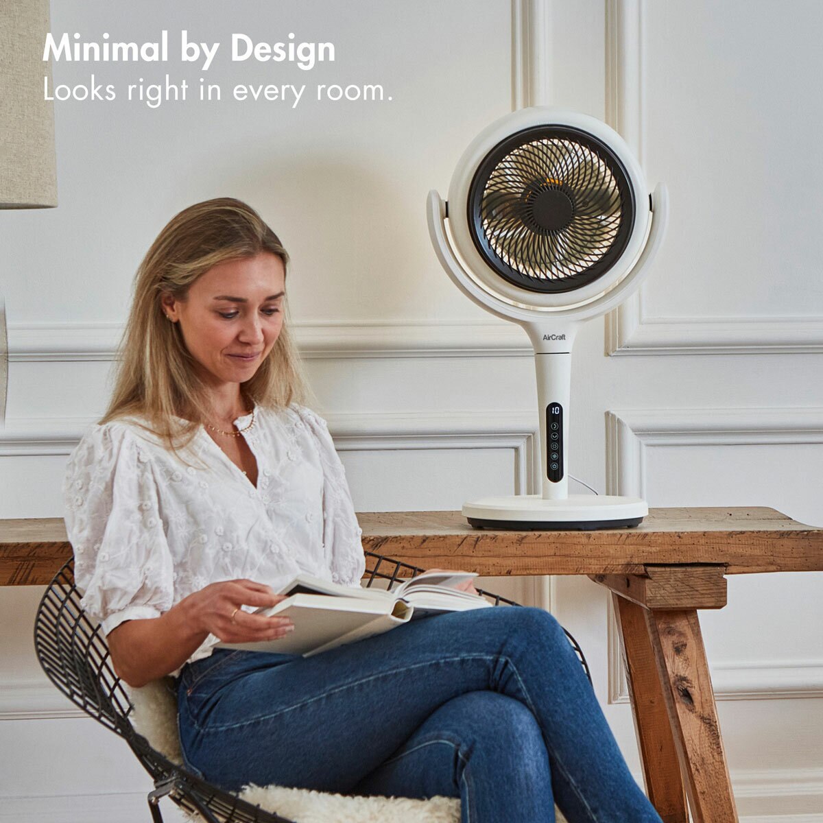 Aircraft LUME Ultra Quiet 2 in 1 Air Circulator Fan,  reading a book