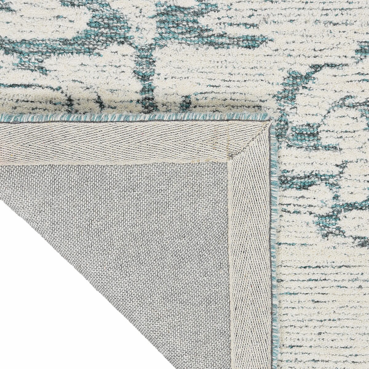 Calvin Klein Sculptural Teal Rug in 2 Sizes