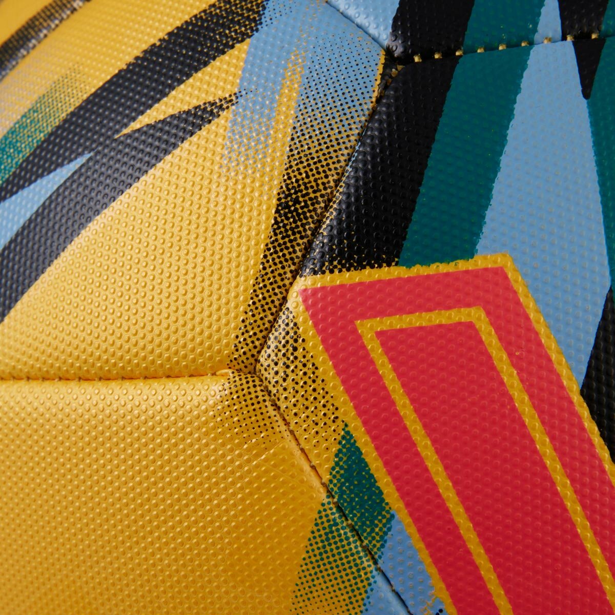 Studio image showing the texture of the yellow ball