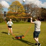 Lifestyle image of two people playing volleyball