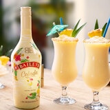 Lifestyle image of bottle with cocktail