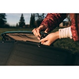Lifestyle image of solar panel being setup