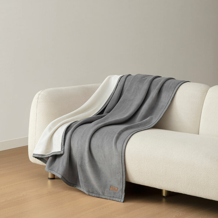 Grey throw on sofa Grey throw on sofa