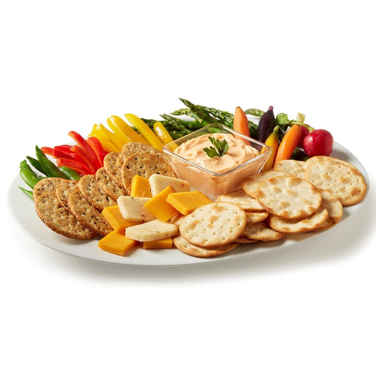 Crackers on a Platter with Cheese and Peppers