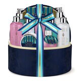 jewellery case filled with toileteries wrapped in ribbon