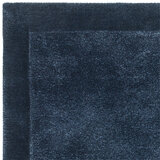 Asiatic rise border rug in navy