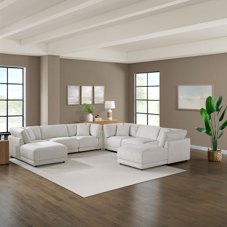 Light Grey Sofa 3pc Wide x2 with 2x Ottomans in the Middle Next to Eachother