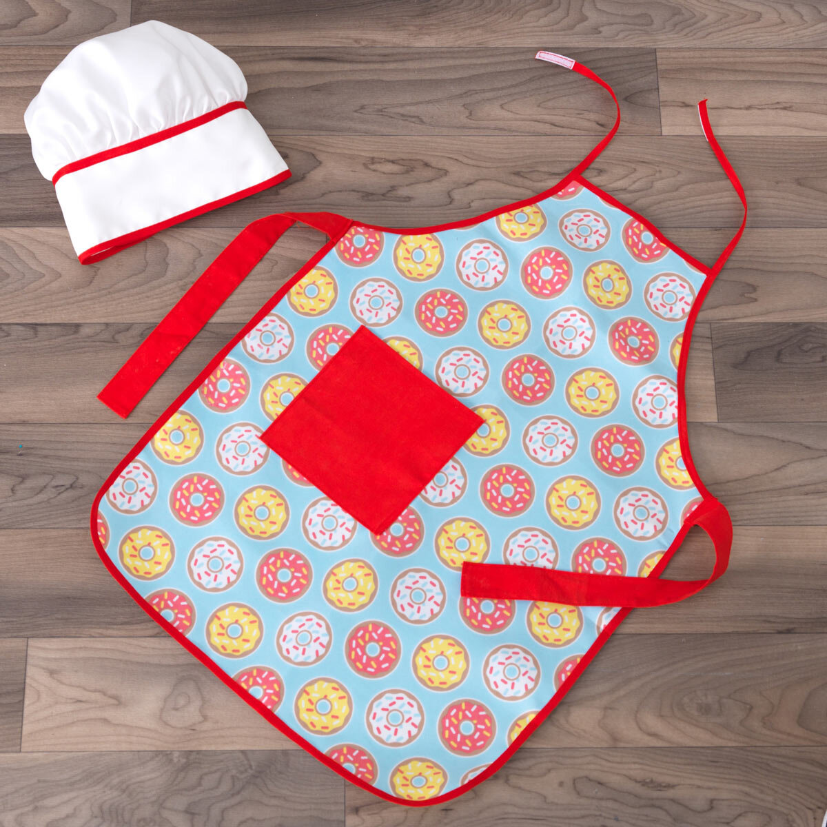 Buy KidKraft Foody Friends Deluxe Activity Center Apron Image at Costco.co.uk