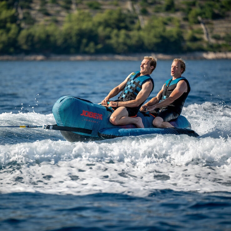 Lifestyle image of two men riding the Jobe Chaser