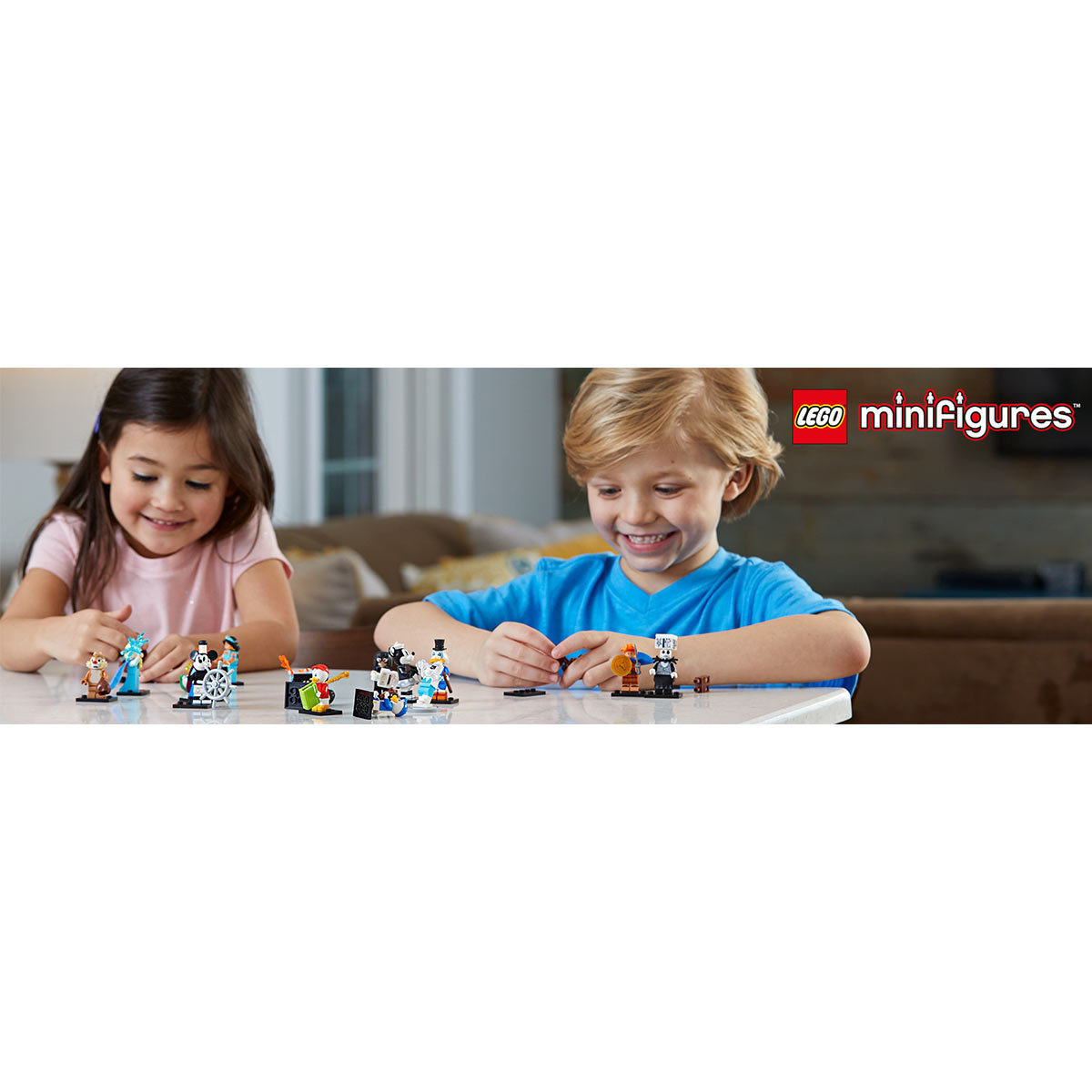 Lifestyle image of children playing with the LEGO disney minifigures