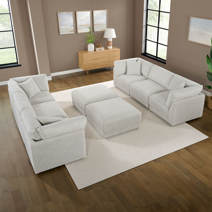 Light Grey Sofa 3pc Wide x2 with 2x Ottomans in the Middle Facing Eachother