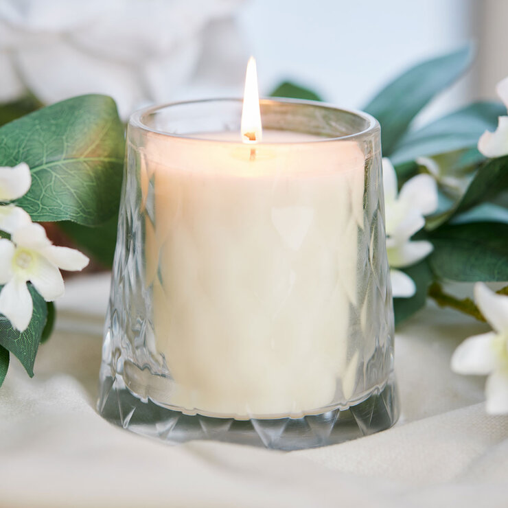 Lifestlye image of candle in clear glass